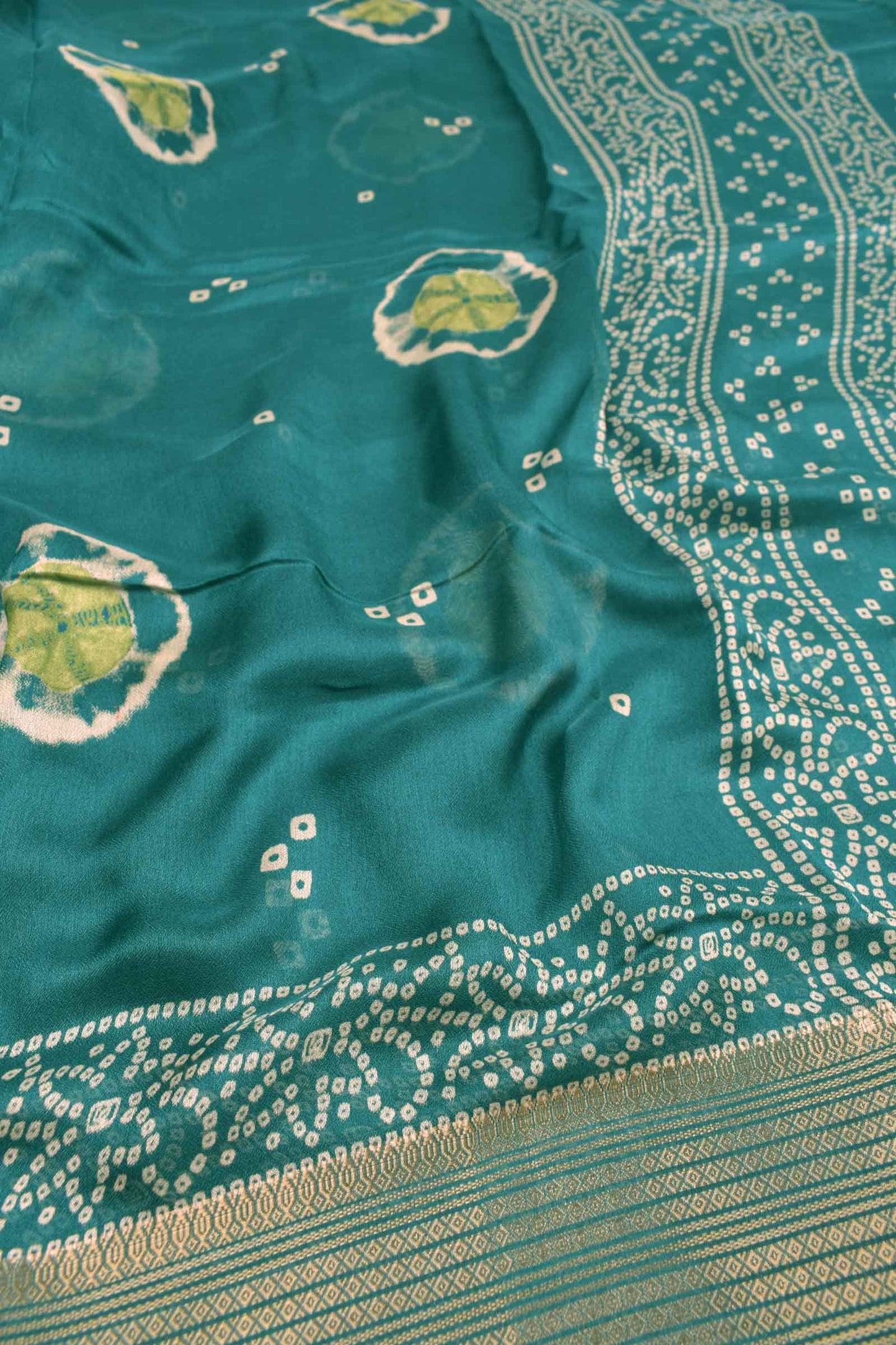 Sea Blue Soft Marshmallow Batik Style Prints Zari Border Saree