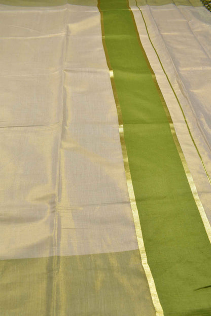 Off White With Green Kerala Tissue Cotton Golden Zari Line Saree