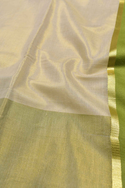 Off White With Green Kerala Tissue Cotton Golden Zari Line Saree