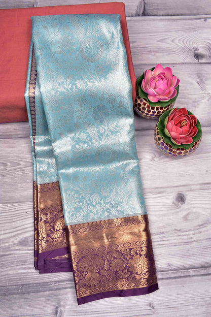 Light Blue Semi Silk Rich Floral Body Contrast Zari Border Pallu Saree