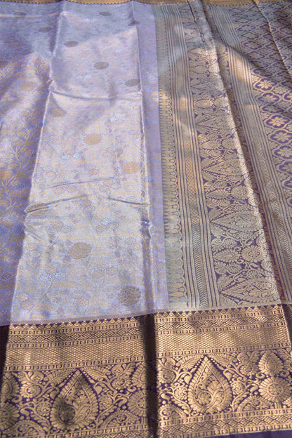 Light Voilet Semi Silk Intricate Floral Body Contrast Zari Border Pallu Saree