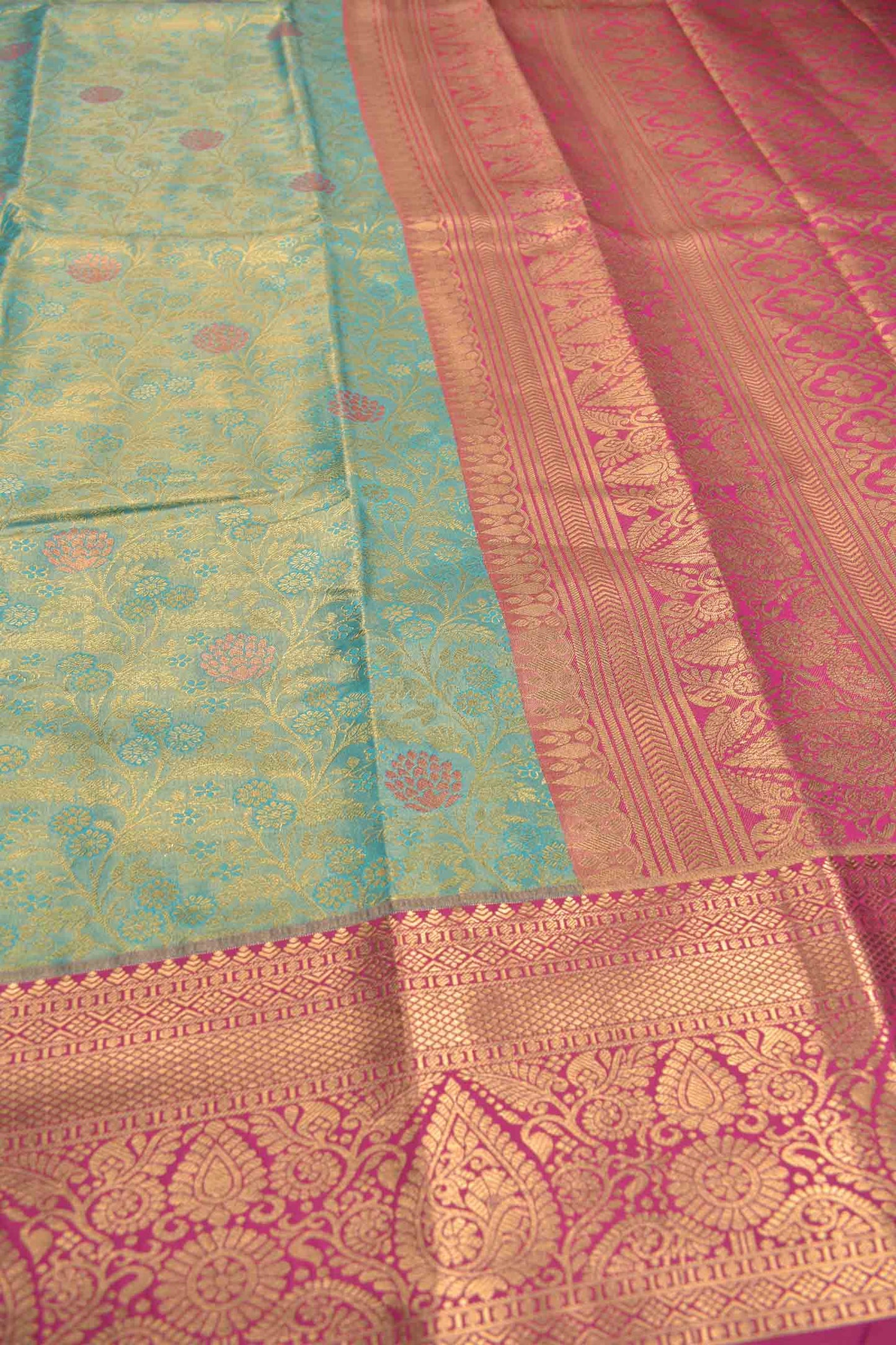 Light Green Semi Silk Rich Floral Body Contrast Zari Border Pallu Saree