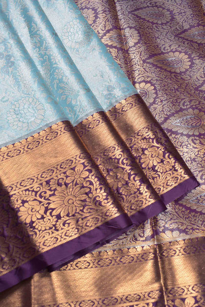 Light Blue Semi Silk Rich Floral Body Contrast Zari Border Pallu Saree