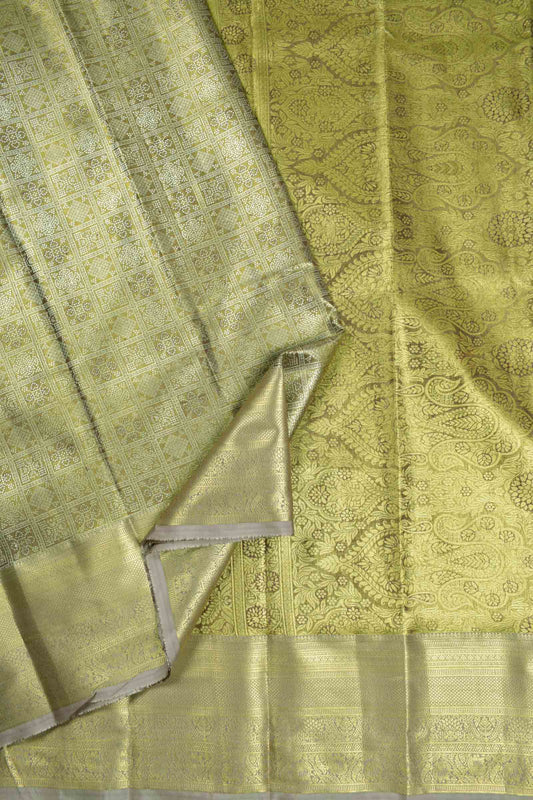Golden Allow Green Semi Silk Tissue Floral Checks Kolam Print Green Zari Pallu Saree