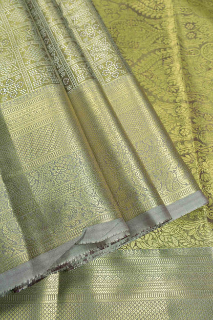 Golden Allow Green Semi Silk Tissue Floral Checks Kolam Print Green Zari Pallu Saree