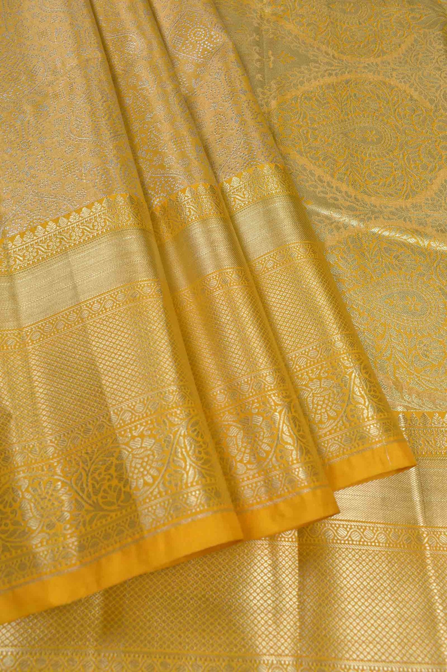 Golden Yellow Semi Silk Tissue Fancy Print Saree