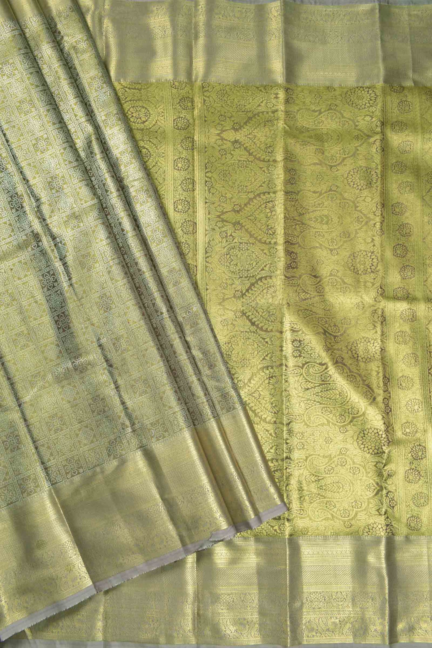Golden Allow Green Semi Silk Tissue Floral Checks Kolam Print Green Zari Pallu Saree