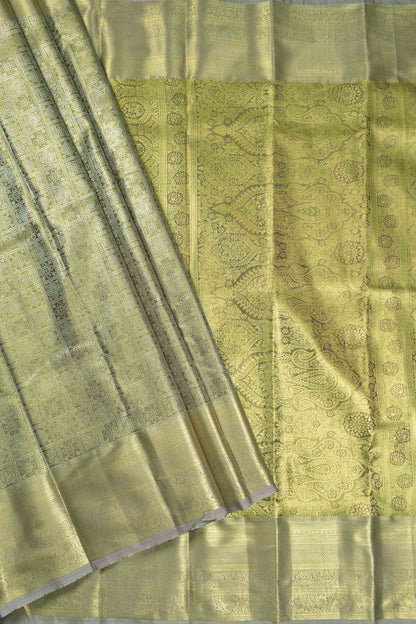 Golden Allow Green Semi Silk Tissue Floral Checks Kolam Print Green Zari Pallu Saree
