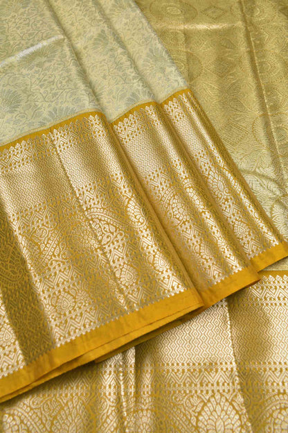 Golden Sandal Semi Tissue Silk Silver Zari Florals Print Yellow Zari Border Saree