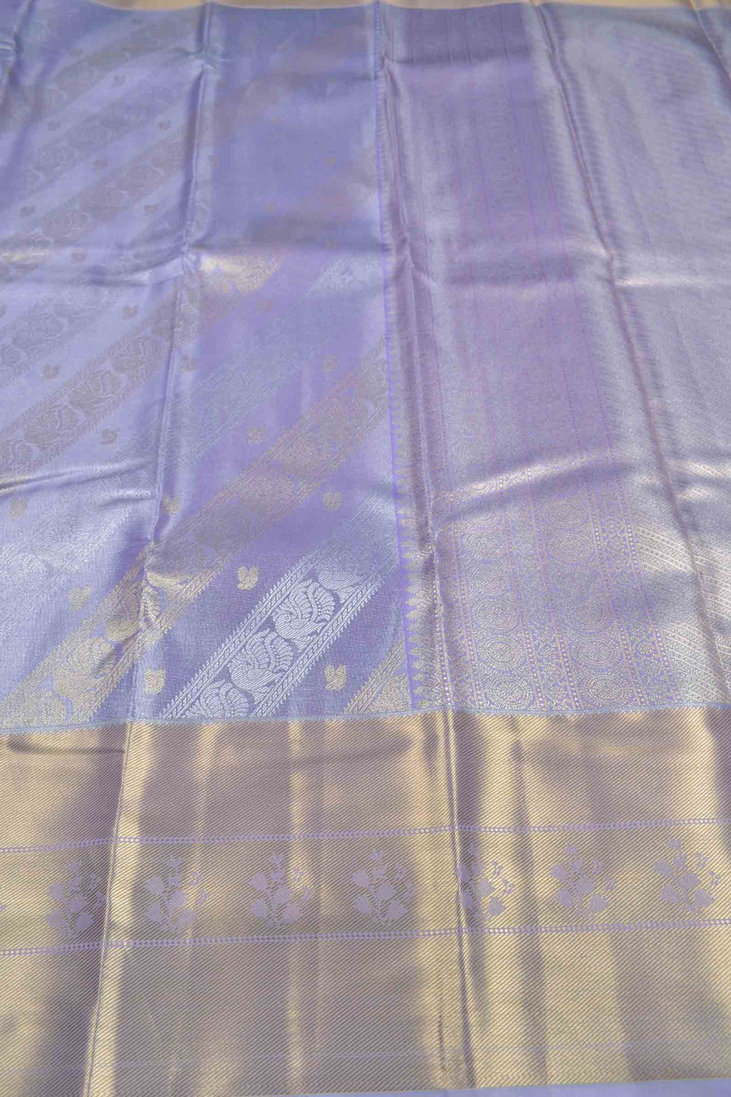 Light Voilet Semi Silk Tissue Fancy Peacock Print Zari Border Saree