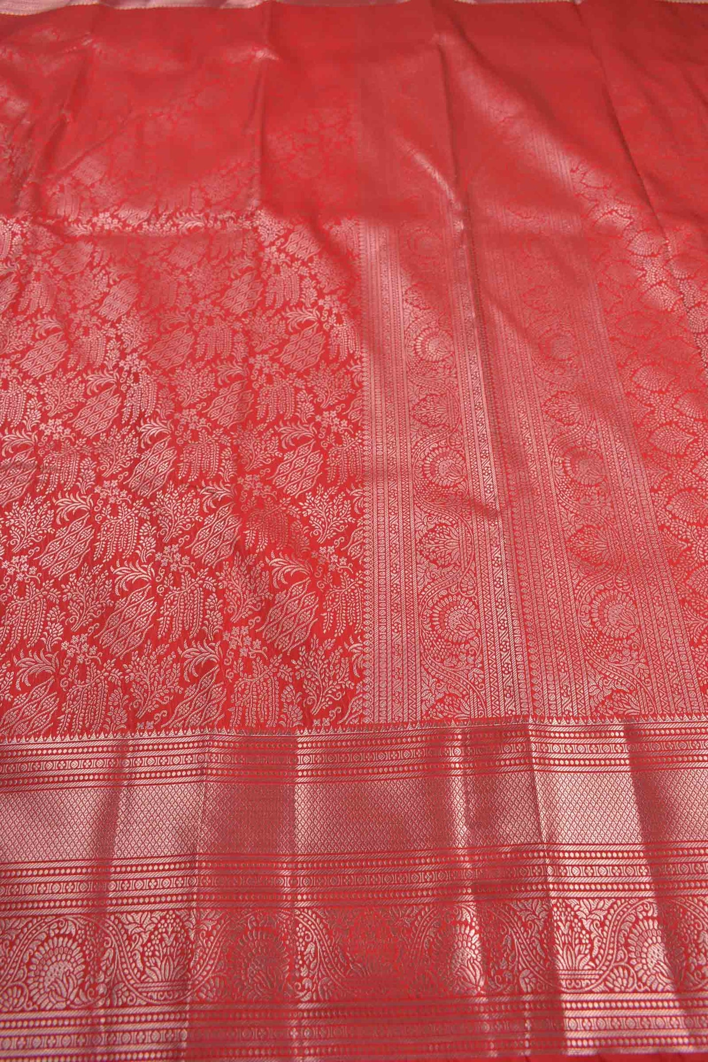 Bold Red Semi Silk Intricate Floral Body Zari Border Saree