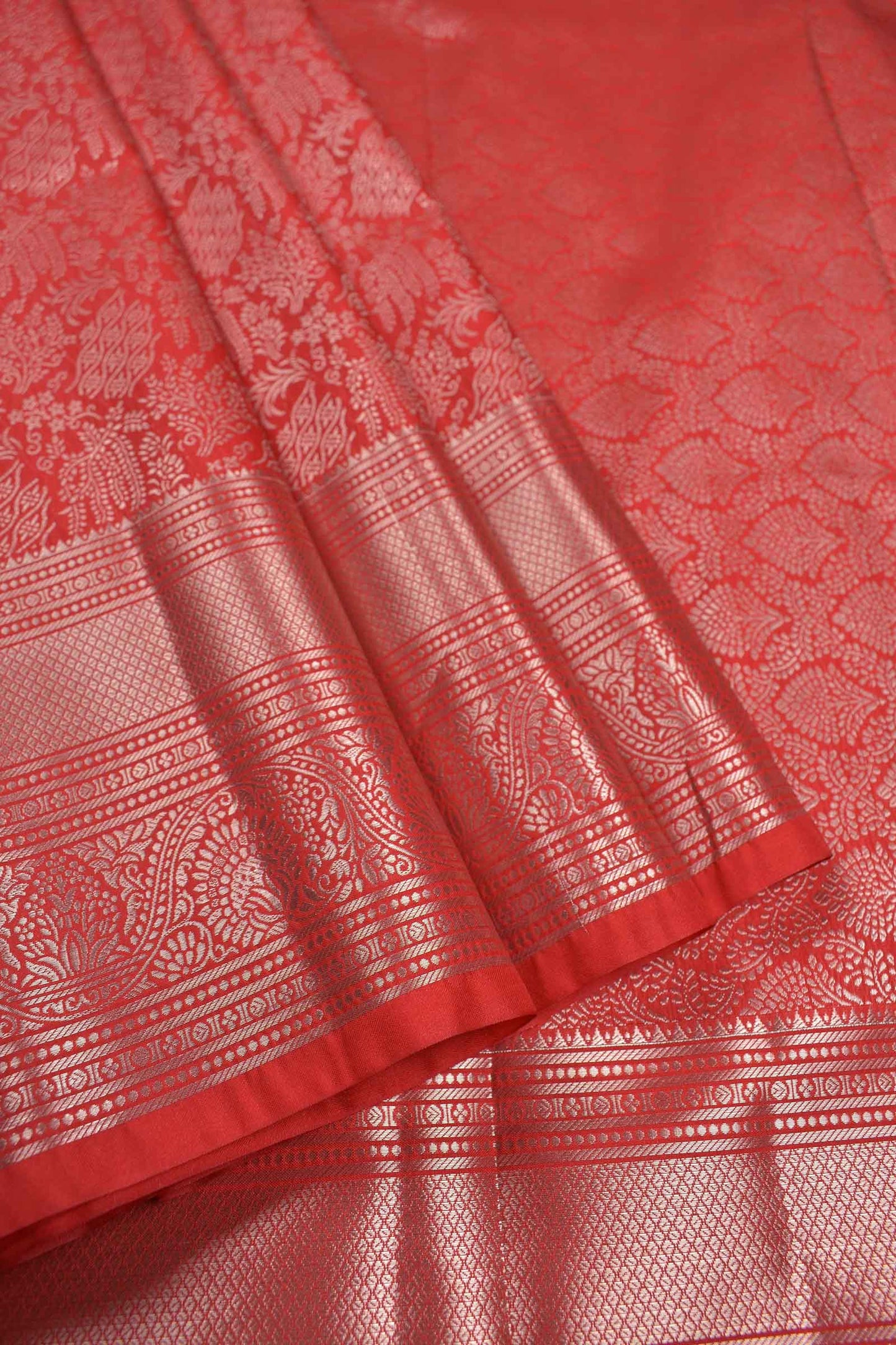 Bold Red Semi Silk Intricate Floral Body Zari Border Saree