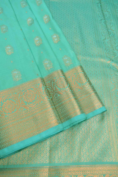 Turquoise Blue Semi Silk Mini Butta Zari Border Saree