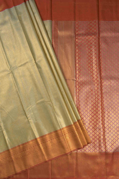 Gold With Silver Semi Tissue Silk Fancy Print  Red Zari Border Pallu Saree