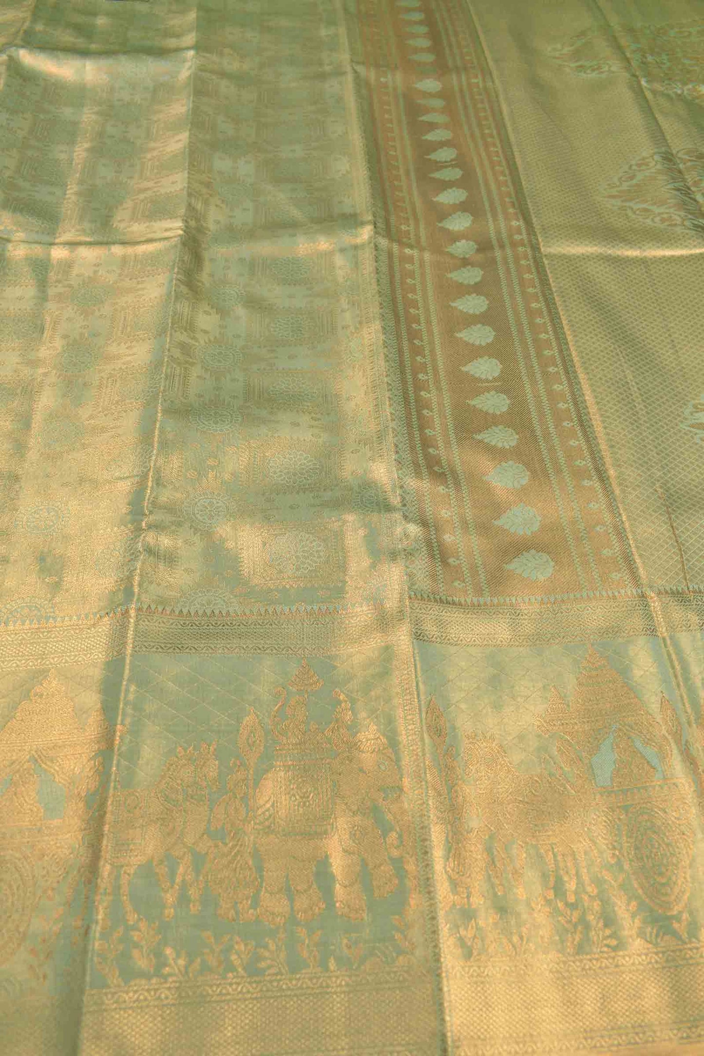 Light Green Semi Tissue Silk Copper Floral Frames Fancy Print Zari Border Saree