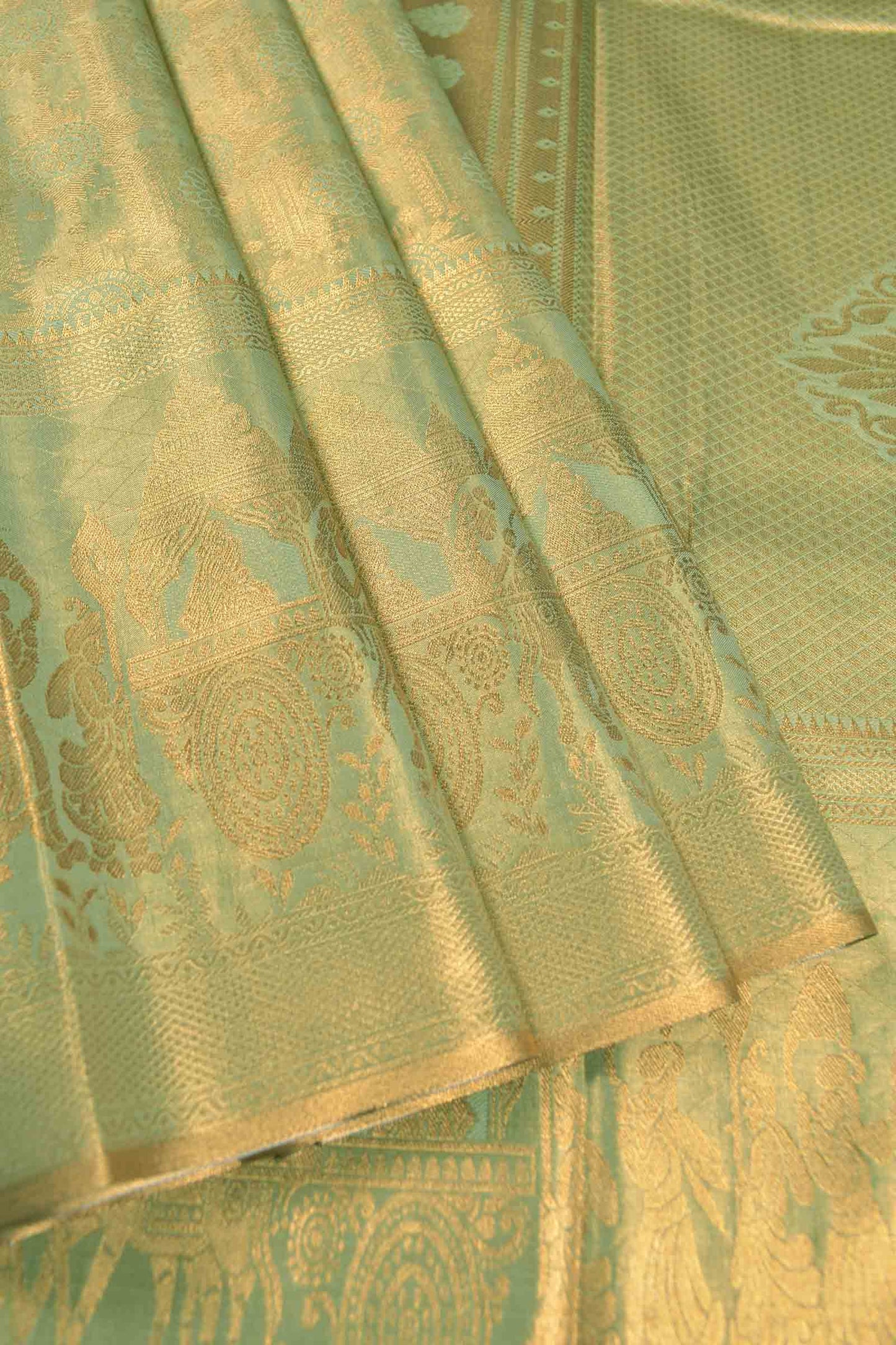 Light Green Semi Tissue Silk Copper Floral Frames Fancy Print Zari Border Saree