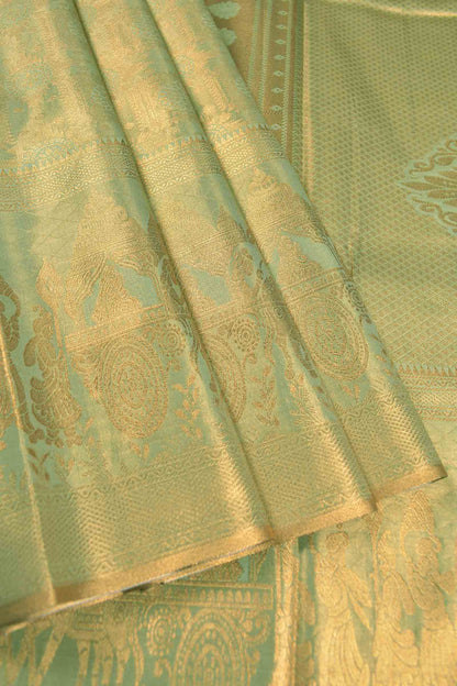 Light Green Semi Tissue Silk Copper Floral Frames Fancy Print Zari Border Saree