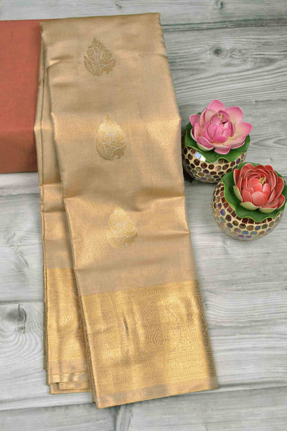 Golden Light Pink Semi Tissue Silk Zari Body Butta Zari Border Soft Saree