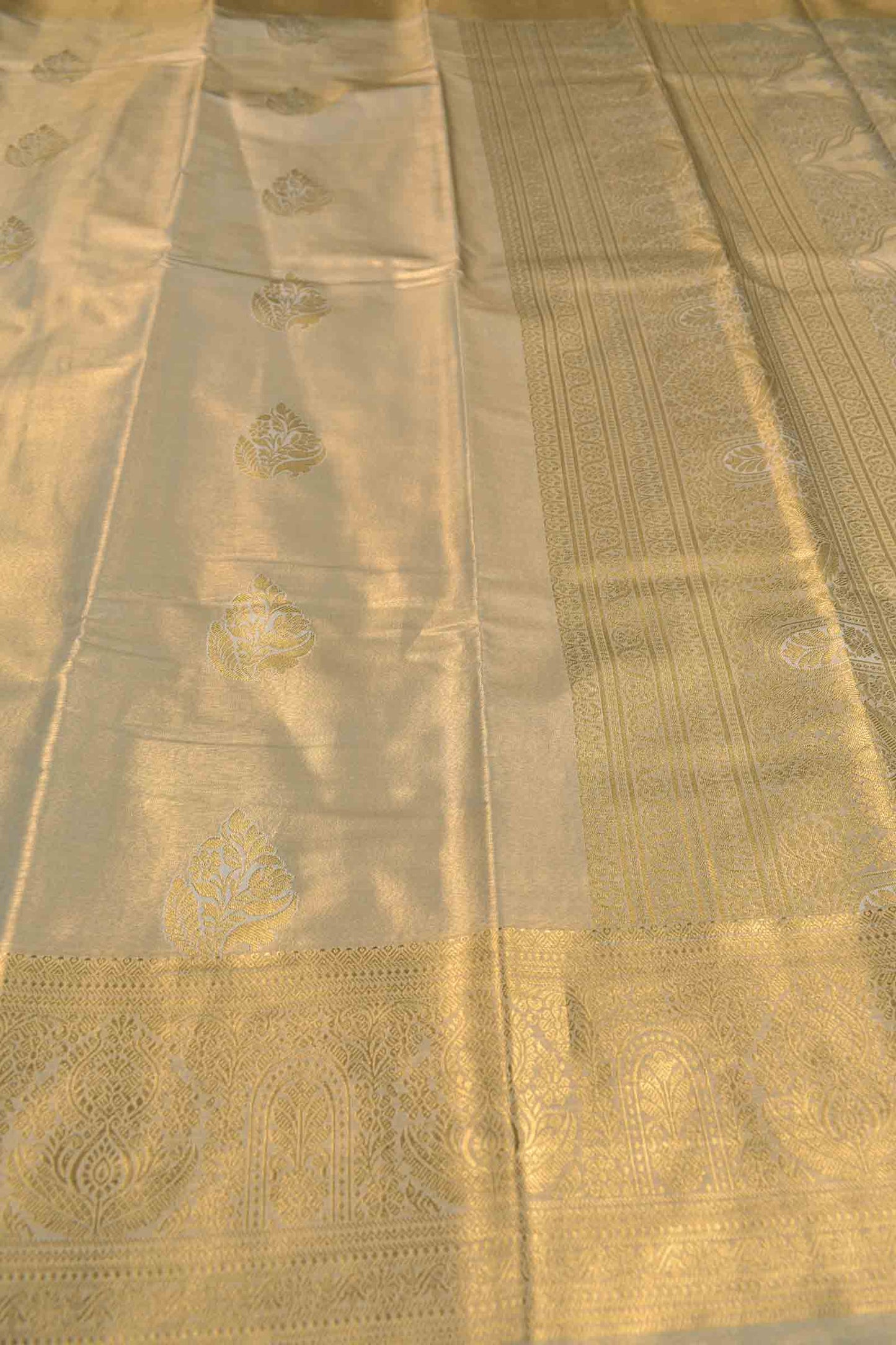 Golden Light Pink Semi Tissue Silk Zari Body Butta Zari Border Soft Saree
