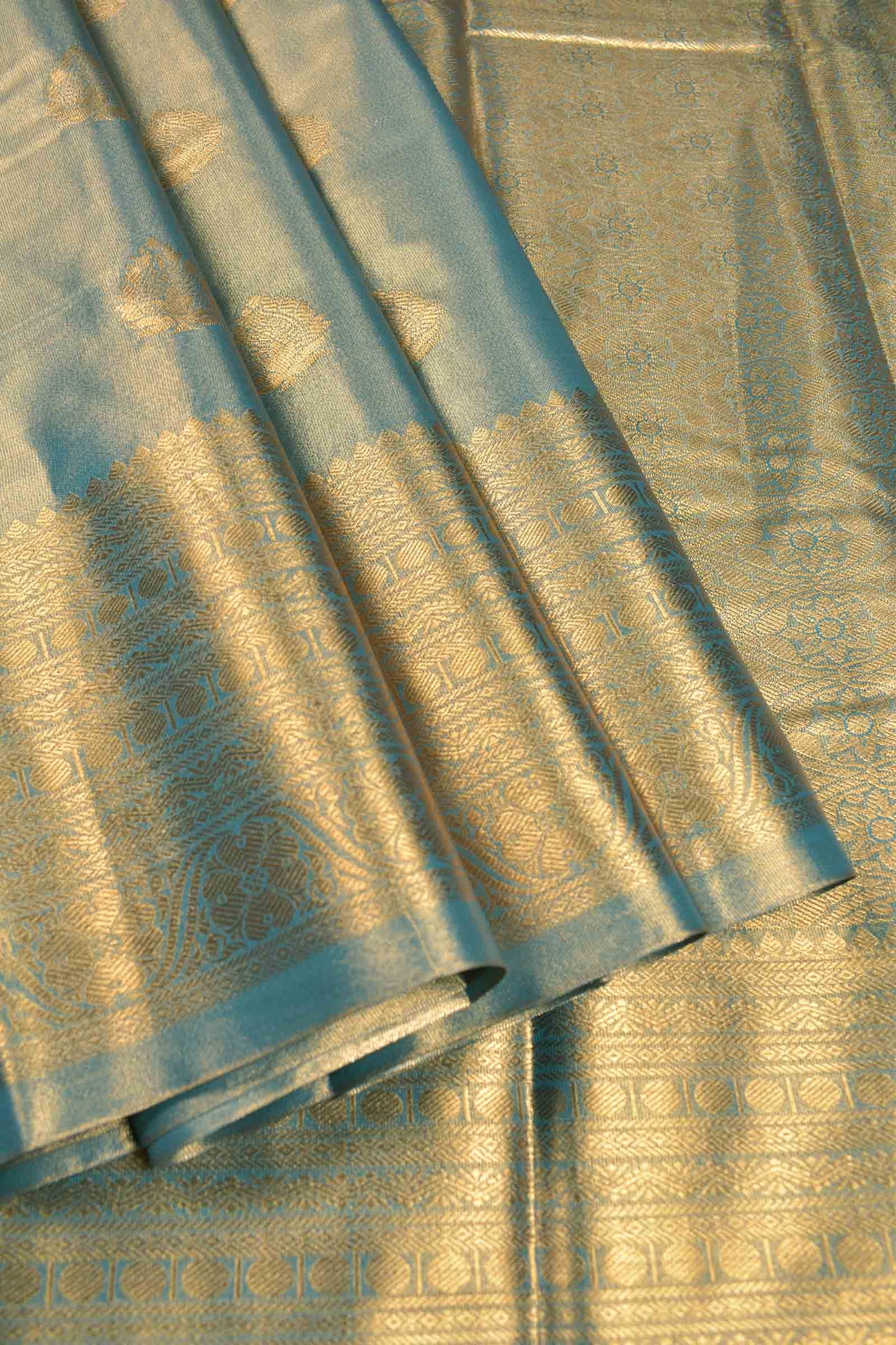 Golden Light Grey Blue Shade Semi Tissue Silk Fancy Butta Zari Border Pallu Saree