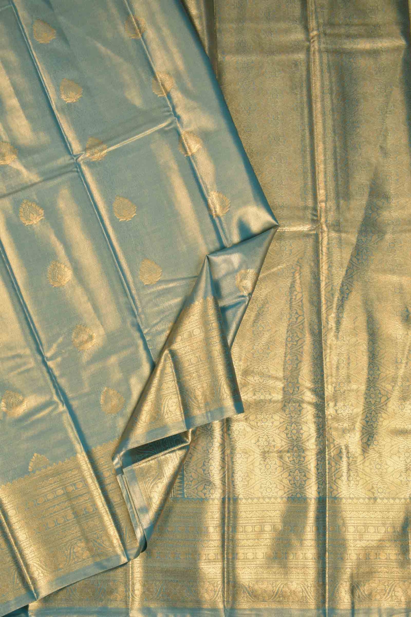 Golden Light Grey Blue Shade Semi Tissue Silk Fancy Butta Zari Border Pallu Saree