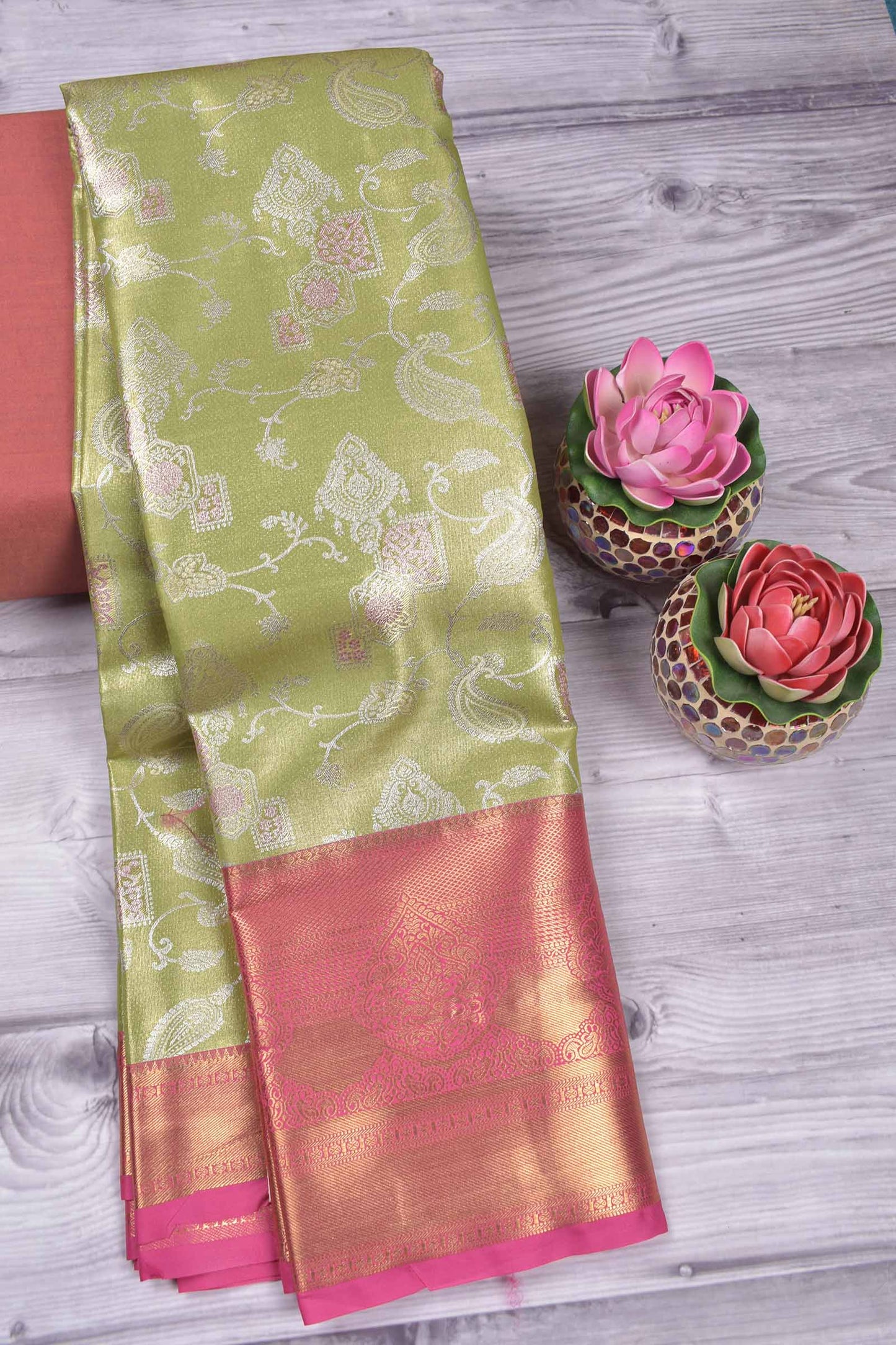 Light Green Semi Tissue Silk Silver Zari Florals Contrast Pink Zari Border Pallu Saree