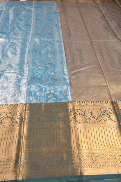 Sky Blue Semi Tissue Silk Silver Zari Florals Contrast Green Zari Border Pallu Saree