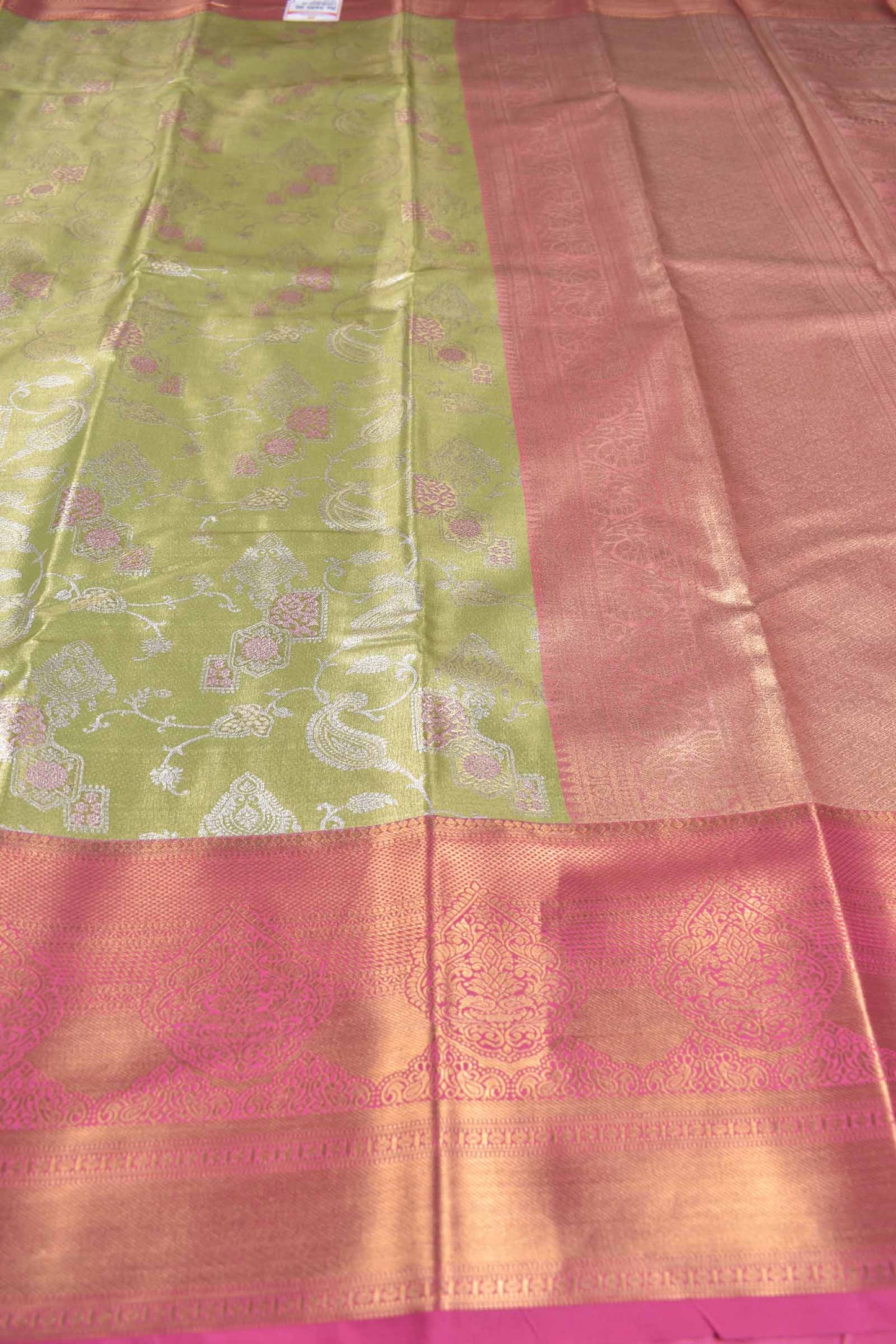 Light Green Semi Tissue Silk Silver Zari Florals Contrast Pink Zari Border Pallu Saree