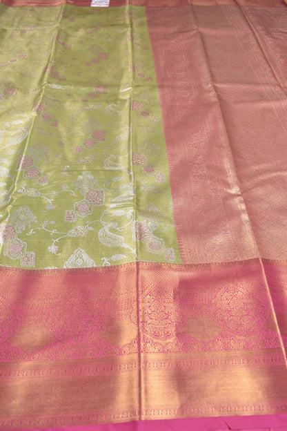 Light Green Semi Tissue Silk Silver Zari Florals Contrast Pink Zari Border Pallu Saree