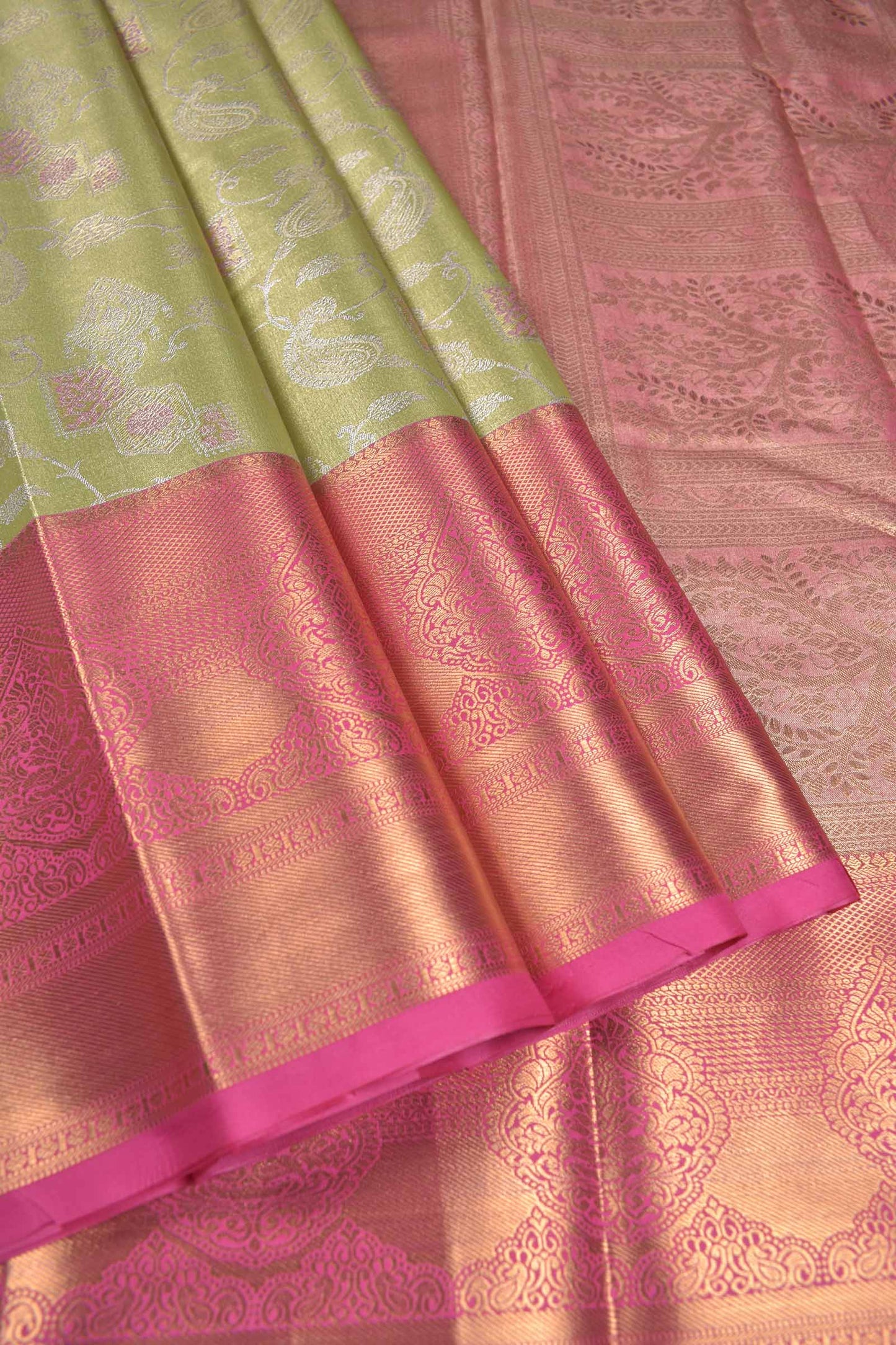 Light Green Semi Tissue Silk Silver Zari Florals Contrast Pink Zari Border Pallu Saree
