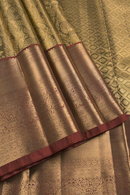 Golden Green Semi Silk Self Zari Florals Zari Border Pallu Saree