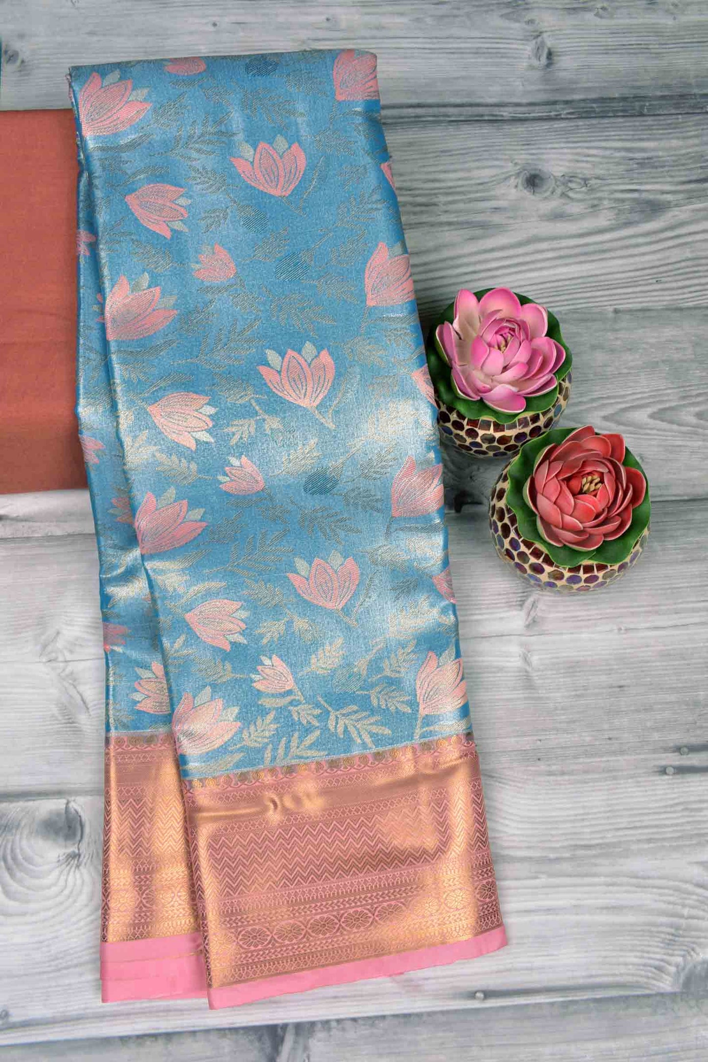 Golden Light Blue Semi Silk Fresh Lilies Golden Pink Zari Border Mango Pallu Saree