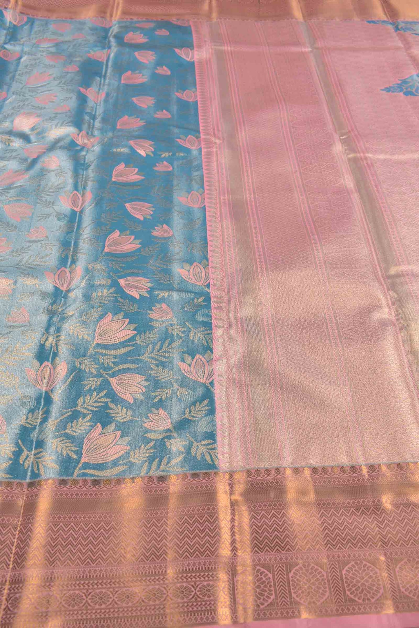 Golden Light Blue Semi Silk Fresh Lilies Golden Pink Zari Border Mango Pallu Saree