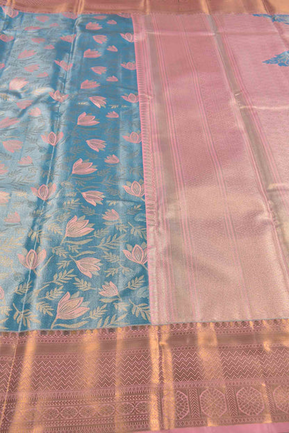 Golden Light Blue Semi Silk Fresh Lilies Golden Pink Zari Border Mango Pallu Saree
