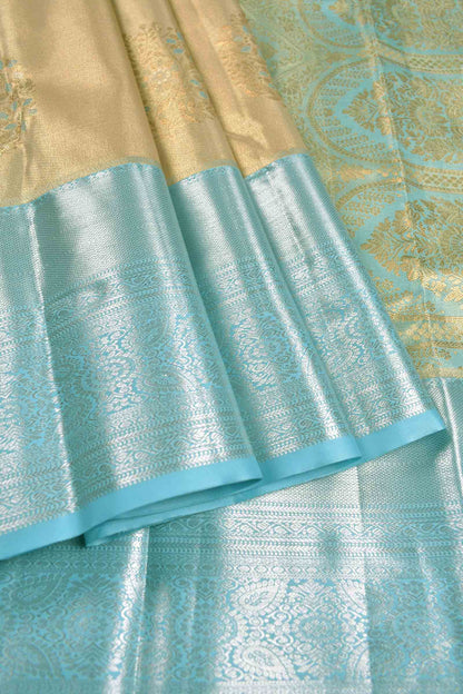 Golden Sandal Semi Silk Floral Wreath Butta Sky Blue Zari Border Pallu Saree