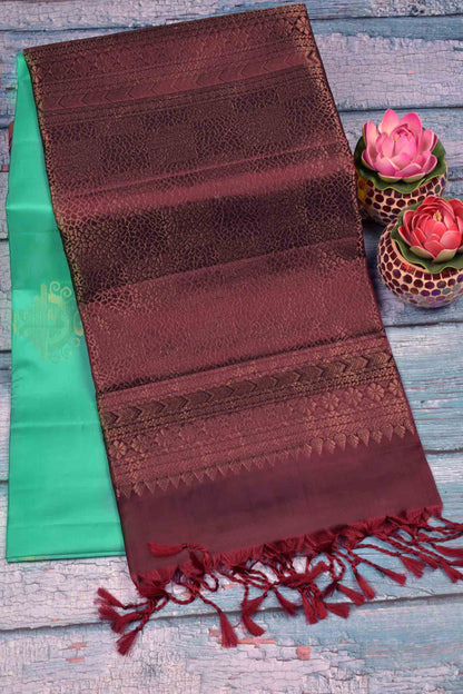 Turquoise Blue Fancy Butta Dark Maroon Pallu Semi Soft Silk Saree