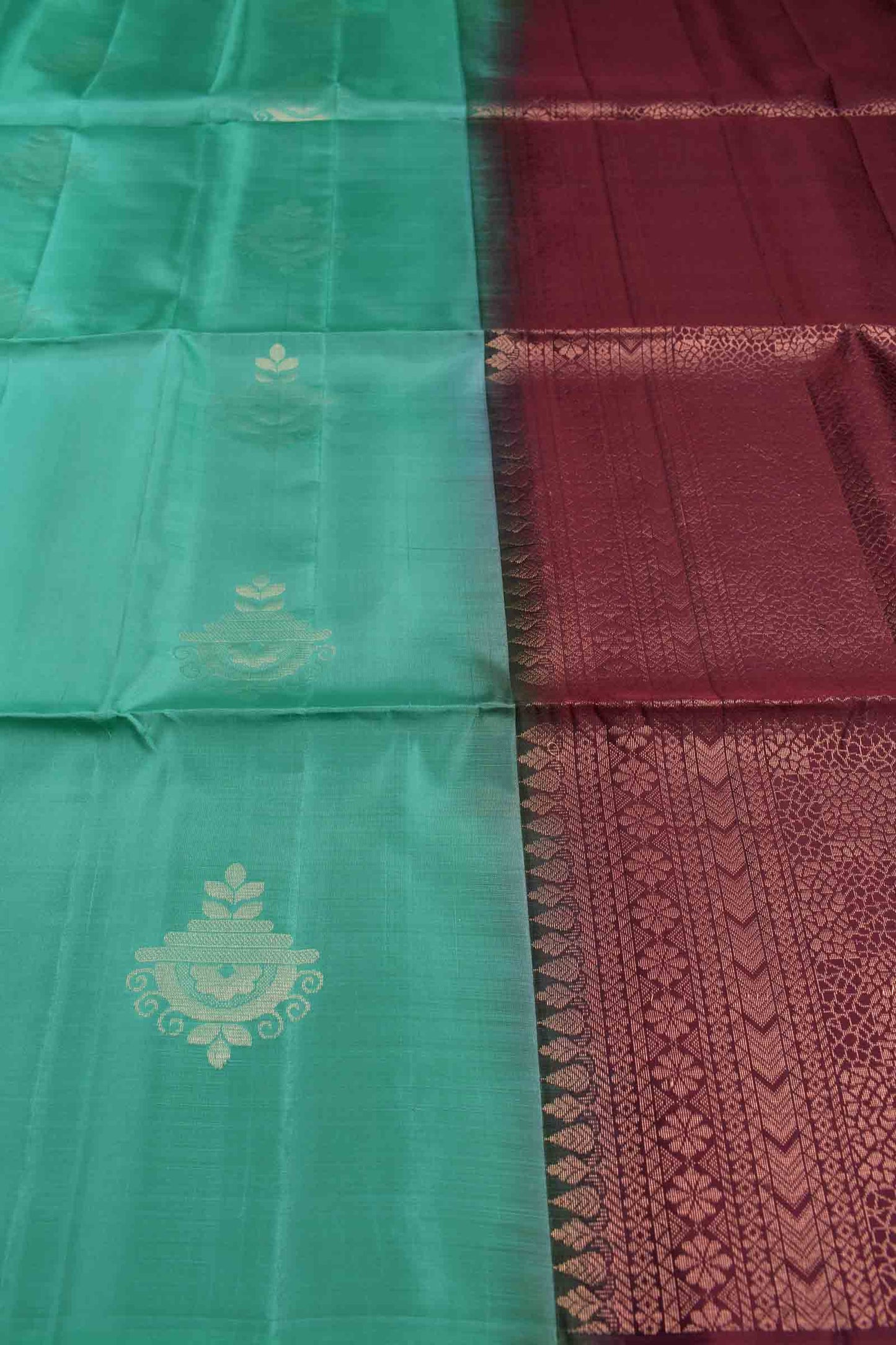 Turquoise Blue Fancy Butta Dark Maroon Pallu Semi Soft Silk Saree