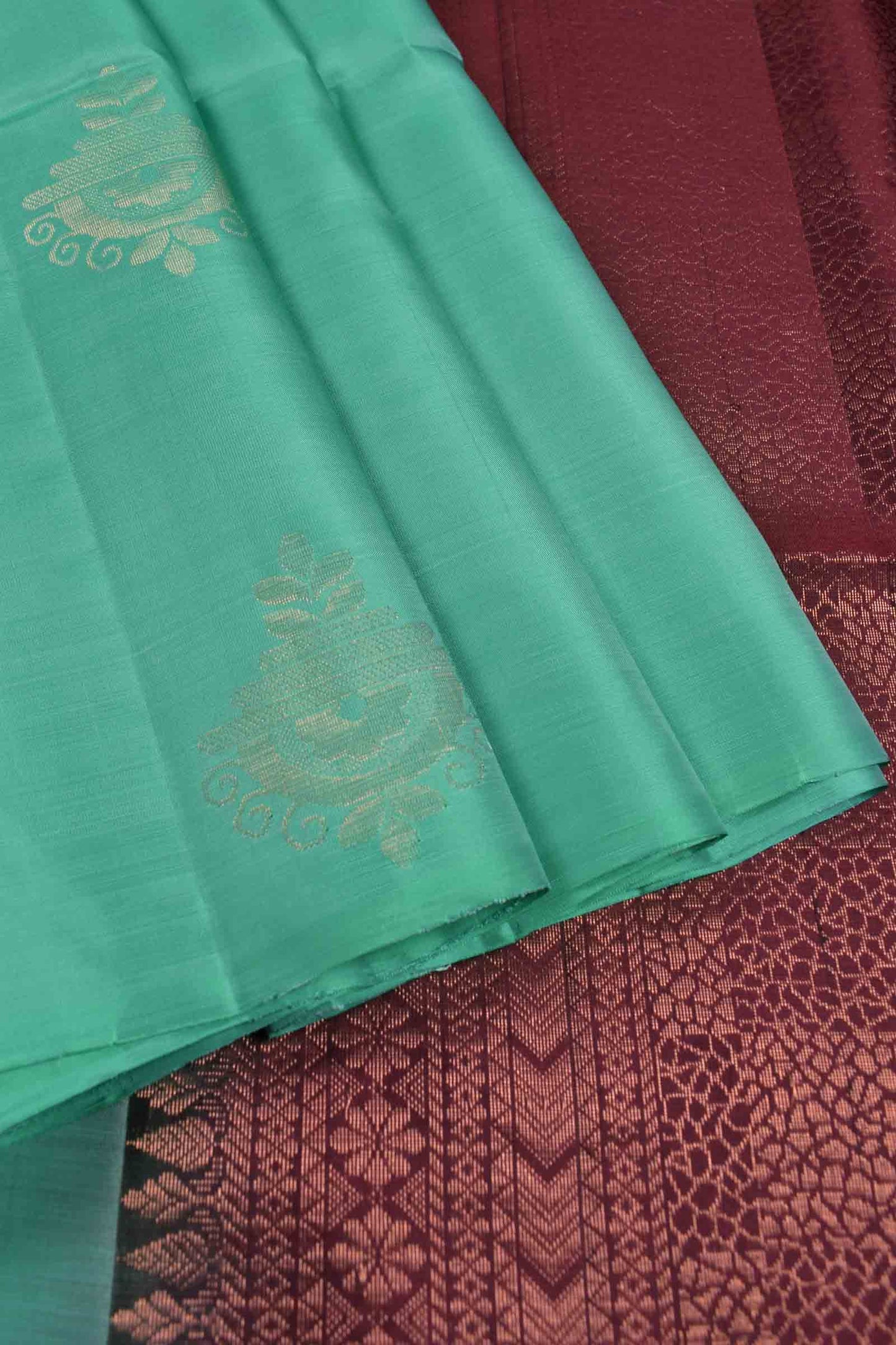 Turquoise Blue Fancy Butta Dark Maroon Pallu Semi Soft Silk Saree