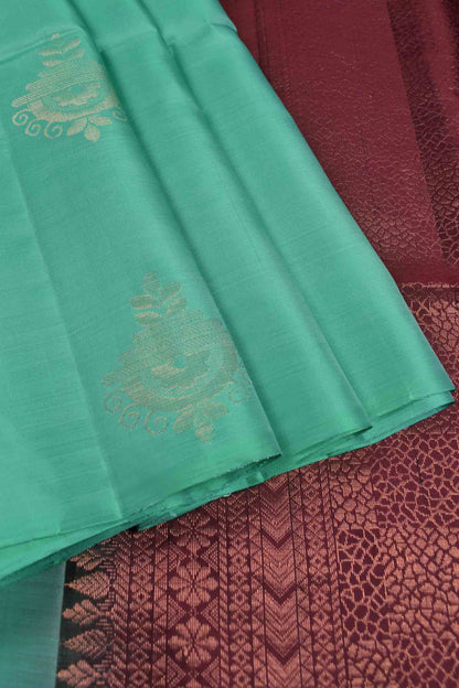 Turquoise Blue Fancy Butta Dark Maroon Pallu Semi Soft Silk Saree