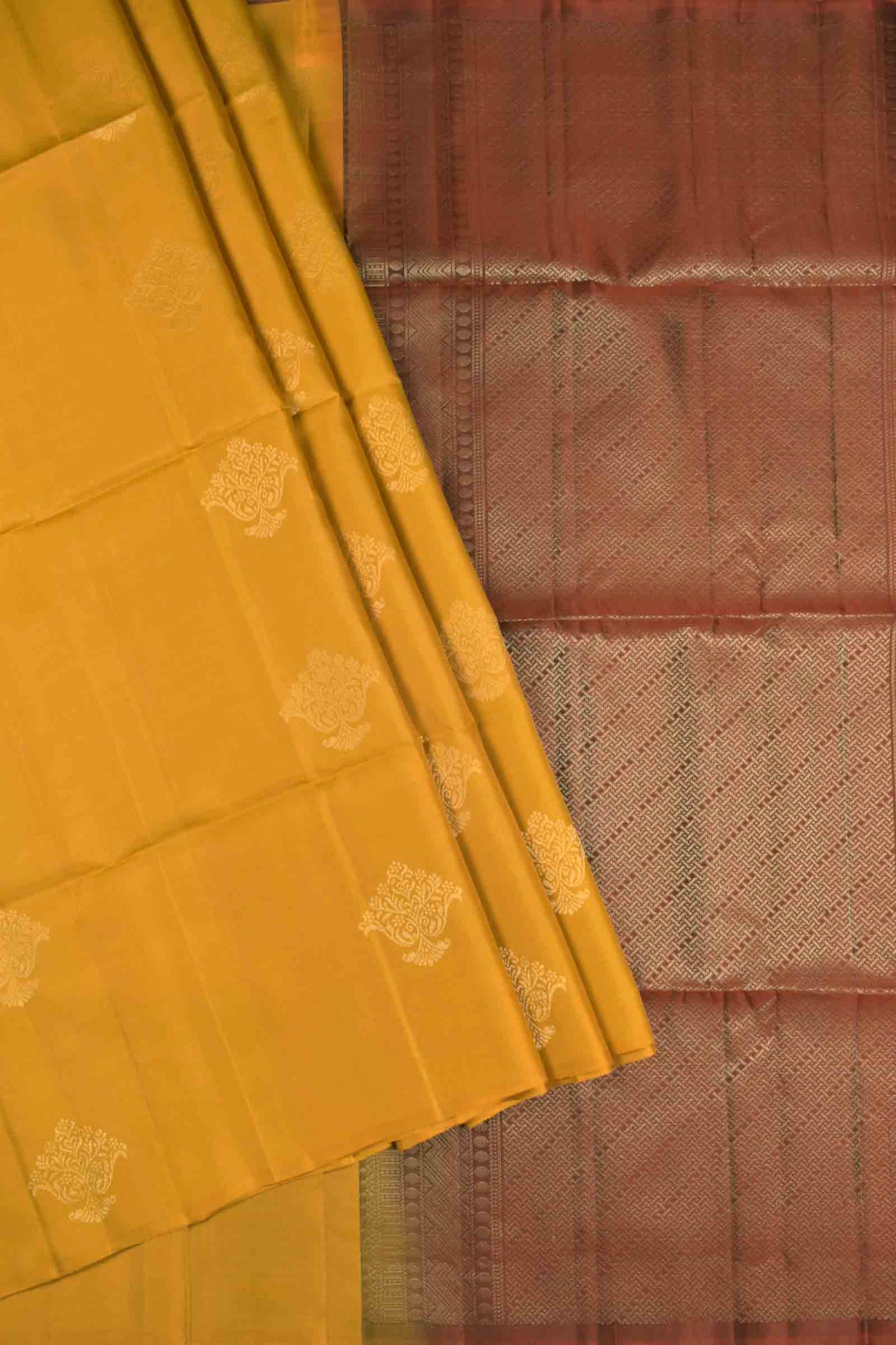 Mustard Yellow Body Floral Butta Contrast Pallu Semi Soft Silk Saree