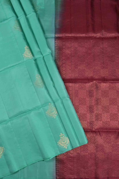 Turquoise Blue Fancy Butta Dark Maroon Pallu Semi Soft Silk Saree