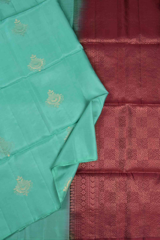 Turquoise Blue Fancy Butta Dark Maroon Pallu Semi Soft Silk Saree
