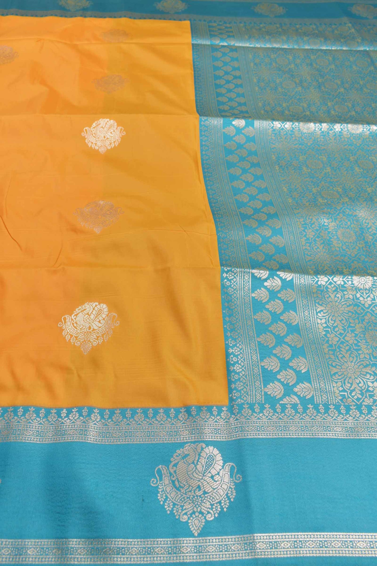 Yellow Peacock Butta Green Contrast Pallu Semi Soft Silk Saree