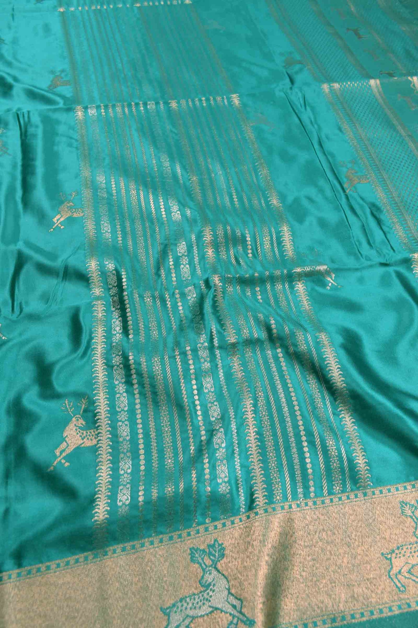 Dark Turquoise Blue Pure Dola Heer Butta Zari Border Saree