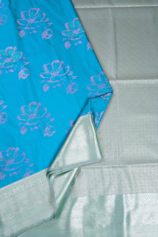 Blue Mega Blooms Butta Zari Border Pallu Semi Soft Silk Saree