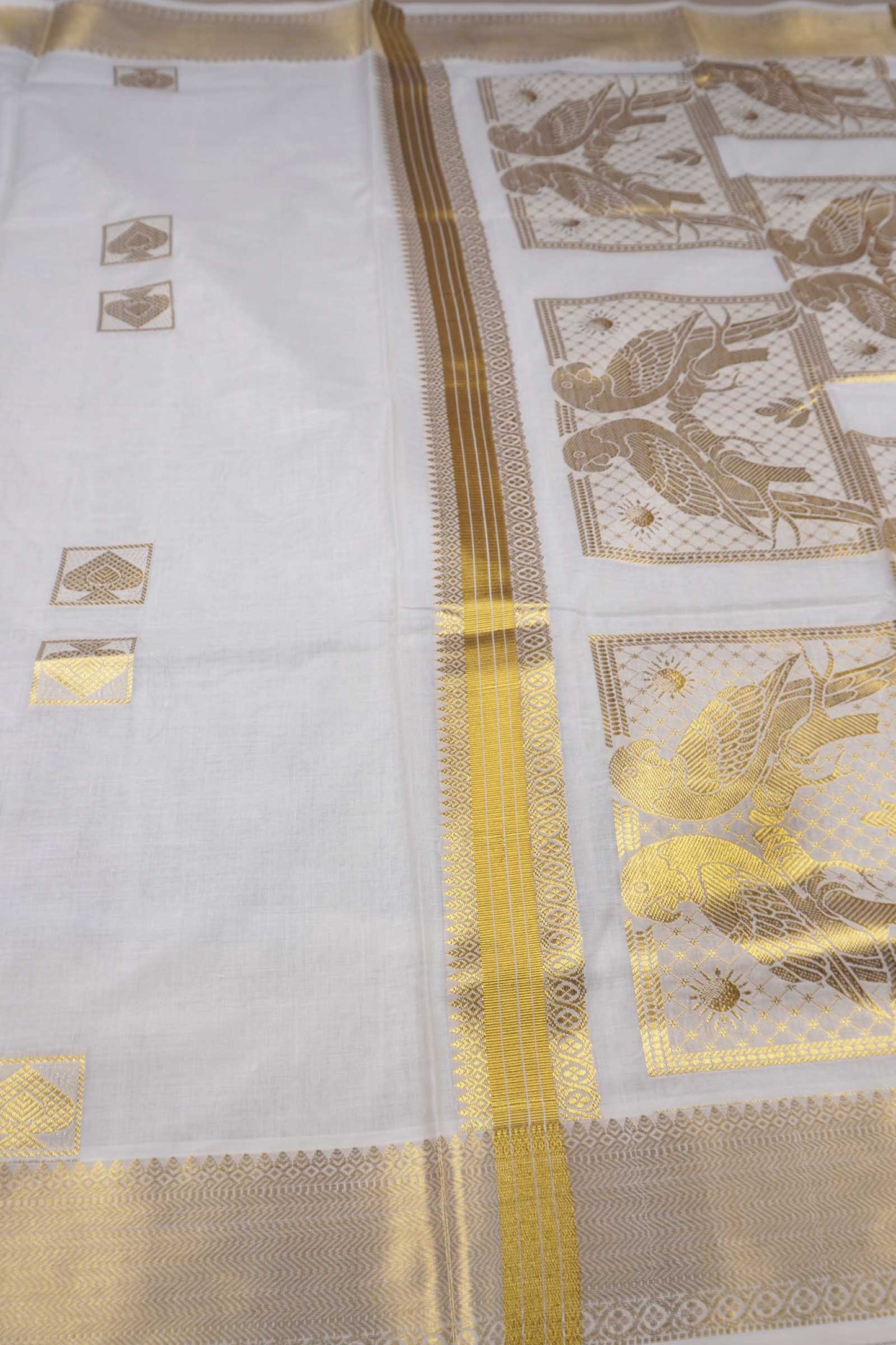 Off White Pure Kerala Cotton Squares Butta Parrots Pallu Saree