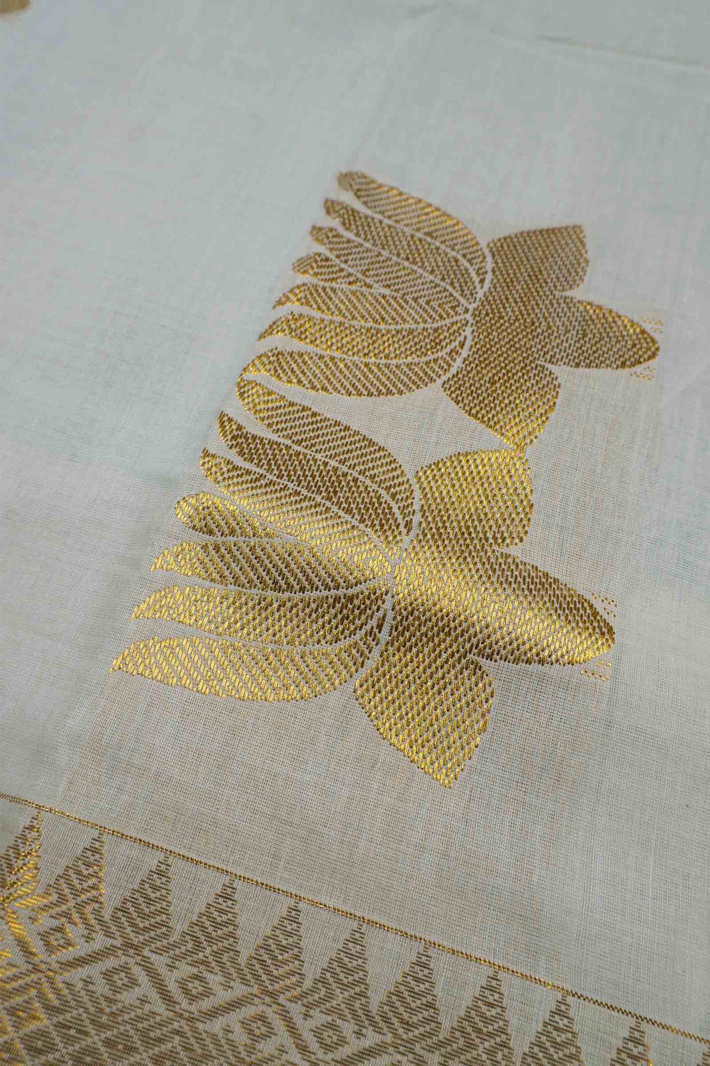 Off White Pure Kerala Cotton Twin Lotus Butta Golden Zari Saree