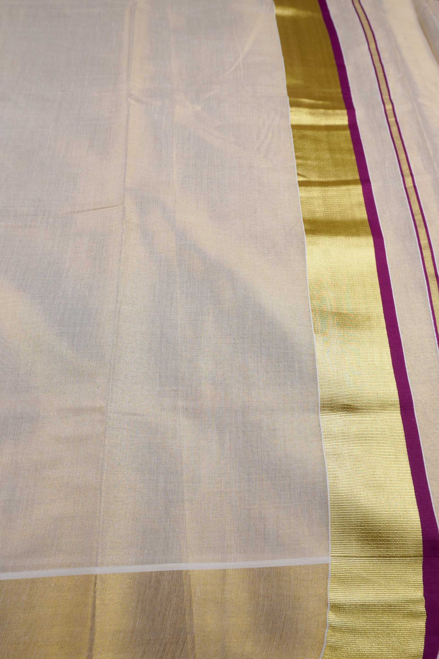 Off White Kerala Fancy Tissue Cotton Golden Zari Pallu Pink Border Saree