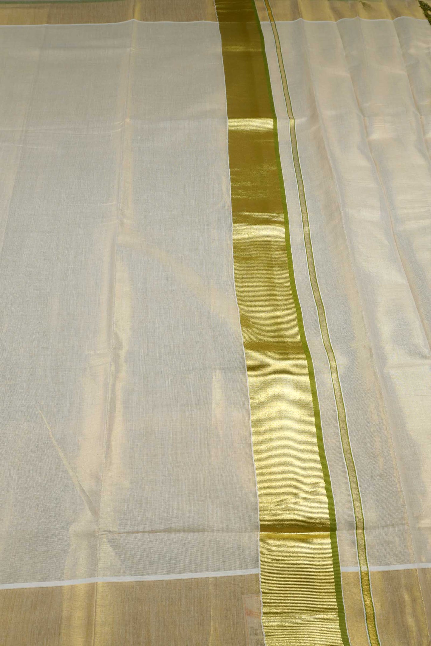 Off White Kerala Tissue Cotton Golden Zari Pallu Green Border Saree