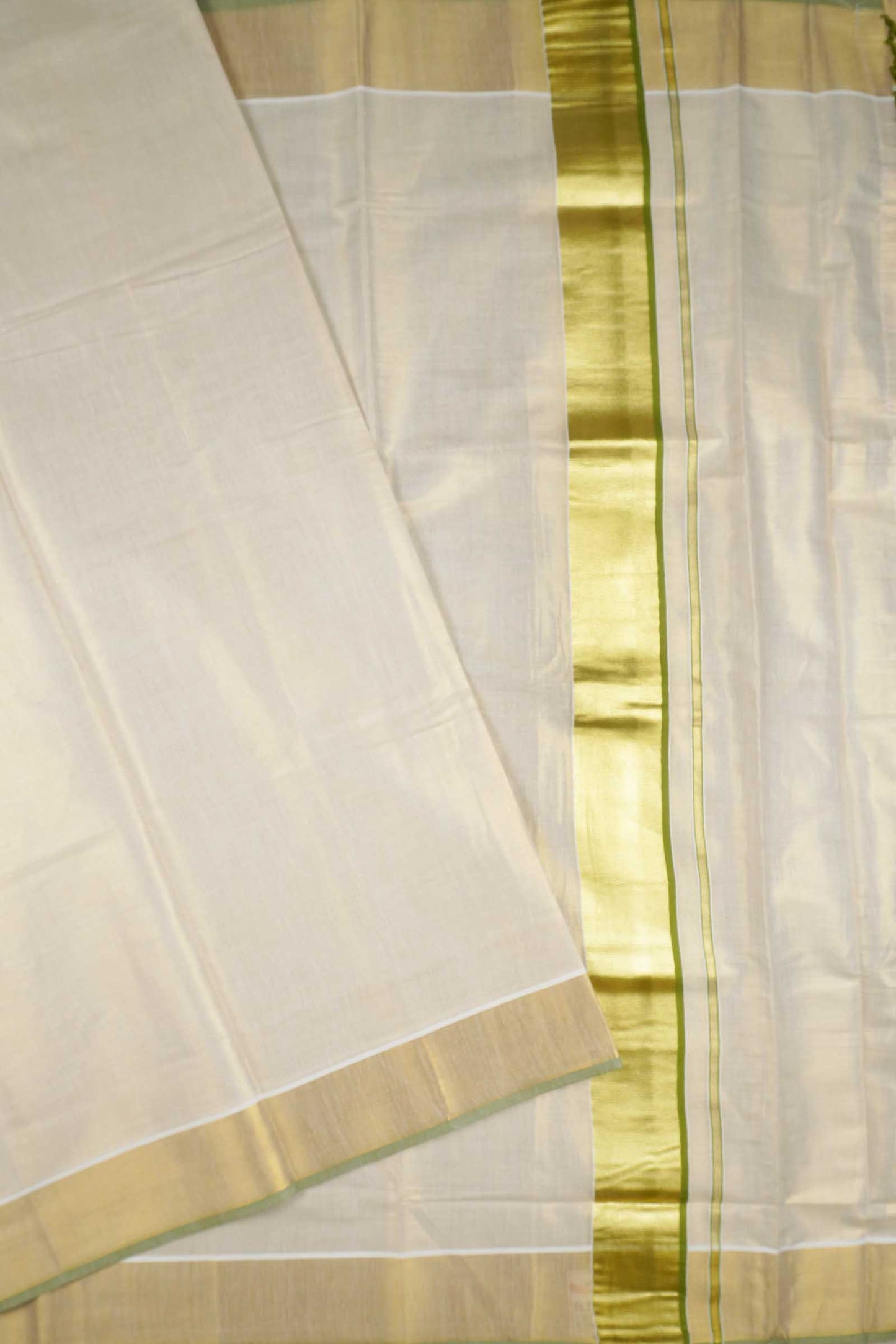 Off White Kerala Tissue Cotton Golden Zari Pallu Green Border Saree